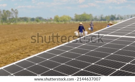 Solar panel for waterpump and farmer in agricultural field Royalty-Free Stock Photo #2144637007