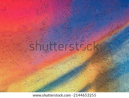 Beautiful bright colorful street art graffiti background. Abstract creative spray drawing fashion colors painting on the walls of the city. Urban Culture, aerosol texture Royalty-Free Stock Photo #2144653255