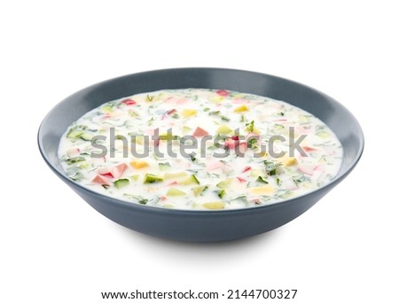 Plate of tasty okroshka on white background