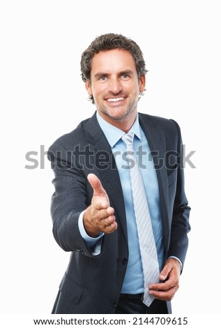 Business handshake. Portrait of successful business man extending hand to shake on white background.