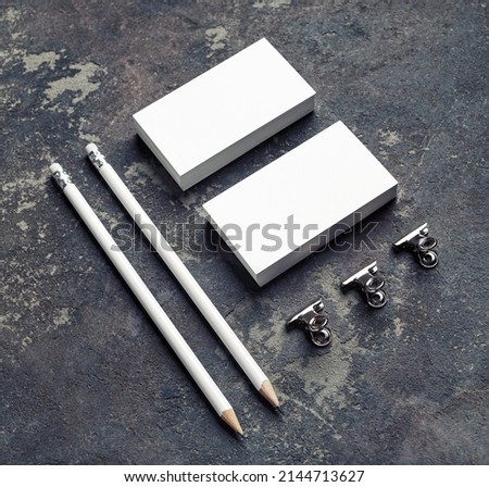 Blank business cards, pencils and clips. Template for graphic designers portfolios.