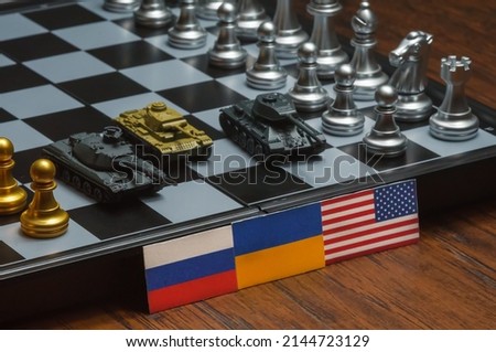 Chess board game. Political conflict between United States, Russia and Ukraine.