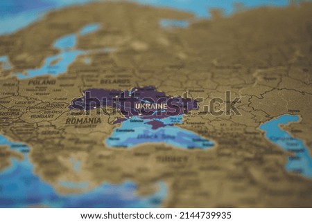 Ukraine on paper map. Ukraine is a country in Eastern Europe. It is the second largest country in Europe after Russia Royalty-Free Stock Photo #2144739935