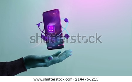 Metaverse and Blockchain Technology Concepts. Person with an Experiences of Metaverse Virtual World via Smart Phone. Futuristic Tone. Conceptual Photo