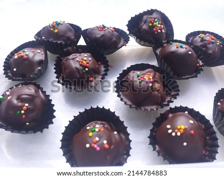 Chocolate cookies with sprinkles on top