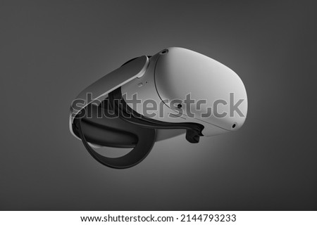 VR virtual reality glasses isolated on gray background. Royalty-Free Stock Photo #2144793233