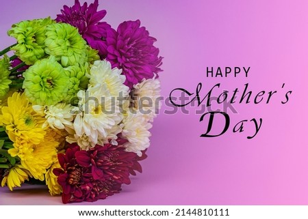 Design concept of Mother's day holiday greeting design with flower bouquet on purple background.
