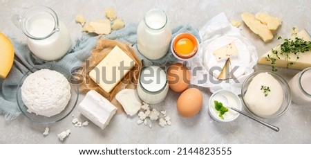 Fresh diary products on light background. Halthy food concept. Top view, flat lay, panorama Royalty-Free Stock Photo #2144823555