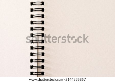 notebook paper with loop for background
