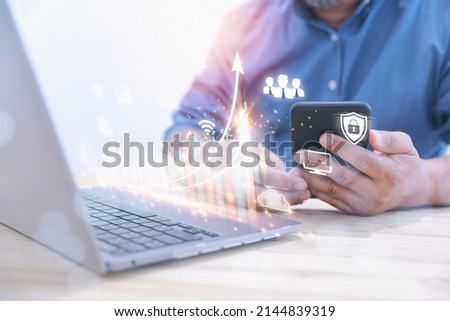 Businessman uses smartphone to analysis stock market investments traded graph financial for profit in the future with copy space. Stock market investments, funds, and digital assets.
