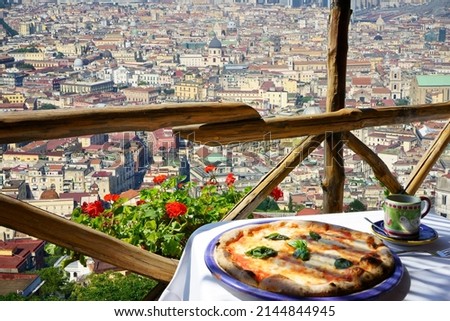                         Pizzeria with city of Naples view Royalty-Free Stock Photo #2144844945