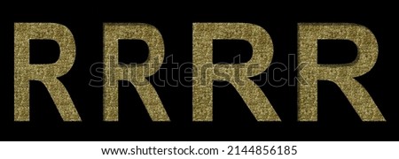 Golden letter R cut out of black paper on the backdrop of a pattern of gold threads, decorative font.