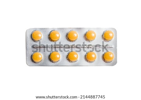 Pharmaceutical blister pack. Pack of pills with tablets. Blister pack of yellow pills isolated on a white background. Pills package. Royalty-Free Stock Photo #2144887745