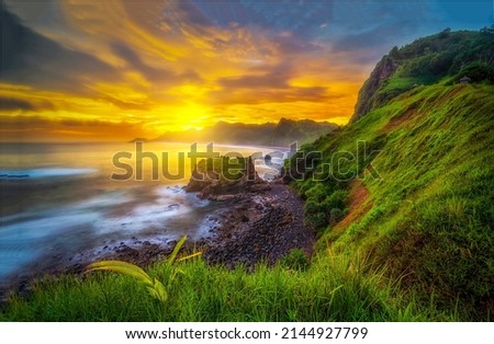 Sunset over the sea bay. Beautiful sunset on coastal landscape. Sea coast at sunset. Sunset sea coast scenery Royalty-Free Stock Photo #2144927799