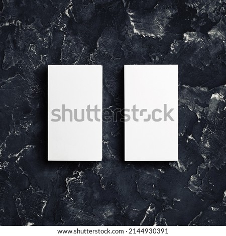 Two blank white business cards. Mockup for ID. Template for graphic designers portfolios. Top view.