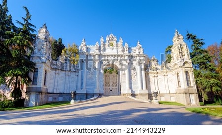 Dolmabahce Palace, Istanbul, Turkey. View of the palace from the side of the strait during sunset Royalty-Free Stock Photo #2144943229