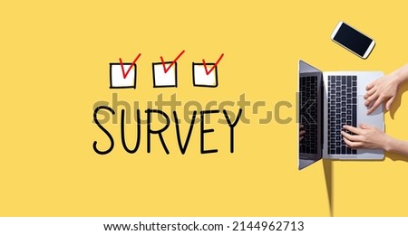 Survey with person working with a laptop