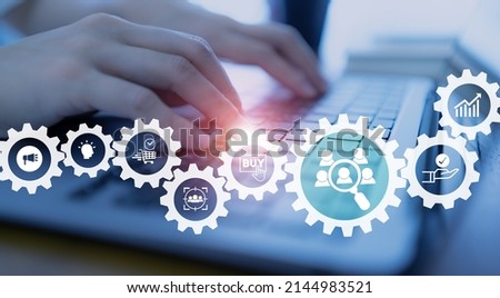 Customer behavior and journey analysis. Customer research. Person working on computer with icons of customer analysis; when, how they buy, why and expectation for marketing plan and strategies. Royalty-Free Stock Photo #2144983521