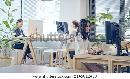 Group of Asian woman working in the office. Royalty-Free Stock Photo #2145012433
