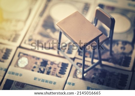 Classroom desk and Japanese banknotes