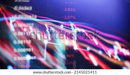 Digital graph interface over dark blue background. Concept of stock market and financial success.