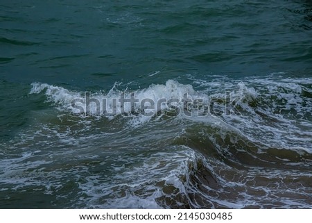 High angle view with strong waves in the sea
