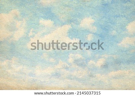 retro sky painting pattern on old paper texture. vintage watercolor clouds. Royalty-Free Stock Photo #2145037315