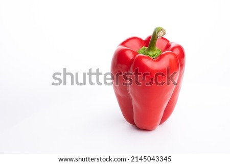 Picture of red bell peppers on a white background.