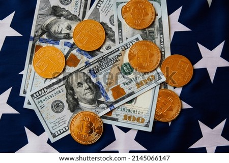 Bitcoin with dollar on USA flag background.