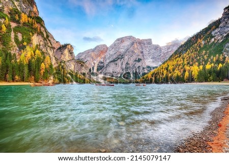 Astonishing scenery of famous alpine lake Braies at autumn. Location:  national park Fanes-Sennes-Braies, region Trentino-Alto Adige , province Bolzano, Italy, Europe