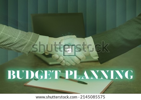 Sign displaying Budget Planning. Business showcase The written description about current and future expenses Man holding Screen Of Mobile Phone Showing The Futuristic Technology.