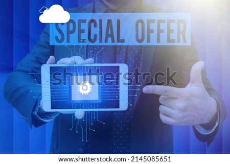 Text showing inspiration Special Offer. Word Written on Selling at a lower or discounted price Bargain with Freebies Man holding Screen Of Mobile Phone Showing The Futuristic Technology.