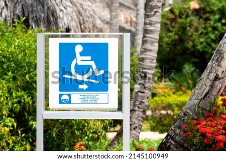 The sign exit road ramp for the disabled in a wheelchair. Caring for people with disabilities in the hotel. High quality photo