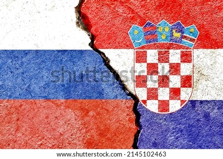 Grunge Russia vs Croatia national flags isolated on weathered cracked wall background, abstract Russia Croatia politics economy relationship friendship divided conflicts concept texture wallpaper