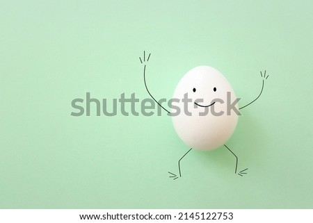 Egg with funny face drawn