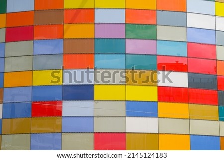 Colorful mosaic building wall as background