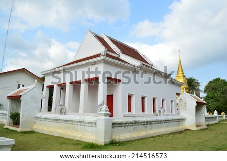 the ancient building of the thai temple in beautiful white paint and surrounding with the nice background.