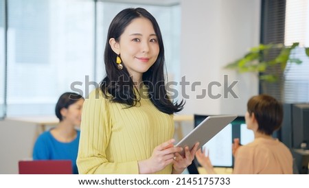 Group of Asian woman working in the office. Royalty-Free Stock Photo #2145175733