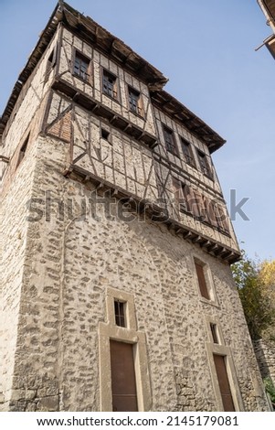 Traditional Ottoman house in Safranbolu. Safranbolu UNESCO World Heritage Site. Old wooden mansion turkish architecture. Wooden ottoman mansion the stone wall  Royalty-Free Stock Photo #2145179081