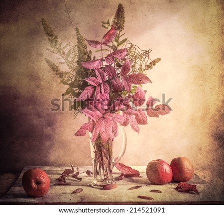 Fall bouquet: Still Life with autumnal sprigs and apples