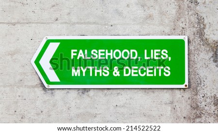 Green sign on a concrete wall - Falsehood lies myths deceits