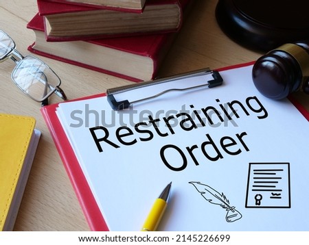 Restraining Order is shown on a photo using the text Royalty-Free Stock Photo #2145226699