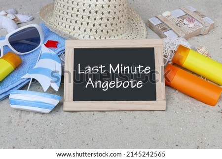 Chalkboard with the text Last Minute Angebote .Last Minute Angebote translated means Last Minute Offers. Royalty-Free Stock Photo #2145242565
