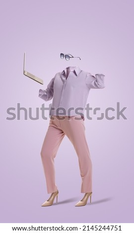Remote work. Portrait of invisible girl wearing modern business style pink outfit and eyeglasses using laptop on very peri color background. Concept of fashion, creativity, art and ad. Royalty-Free Stock Photo #2145244751