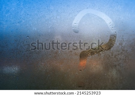 the inscription on glass, question mark concept