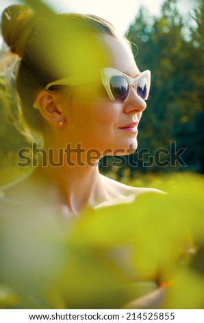 Portrait of an attractive woman in sunglasses