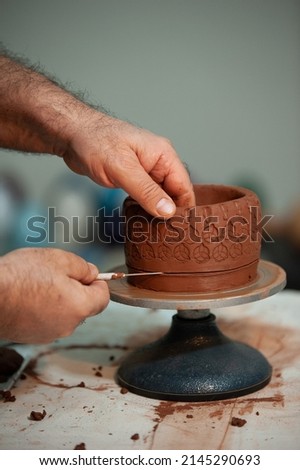 
woman working with ceramic clay