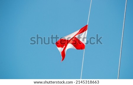 nautical signal flag on a boat moored in rio de janeiro, Brazil. Royalty-Free Stock Photo #2145318663