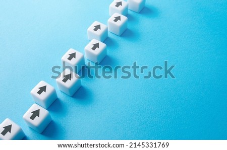 Chain of arrows blocks. Consistency and focus. Concept of conformism, vertical of power. Unchanging course of development. Education and skill growth. Building a solid strategy. Royalty-Free Stock Photo #2145331769