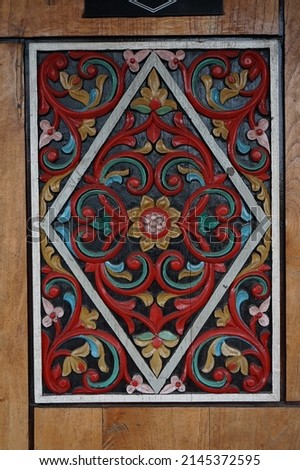 traditional Minangkabau carvings for door decoration